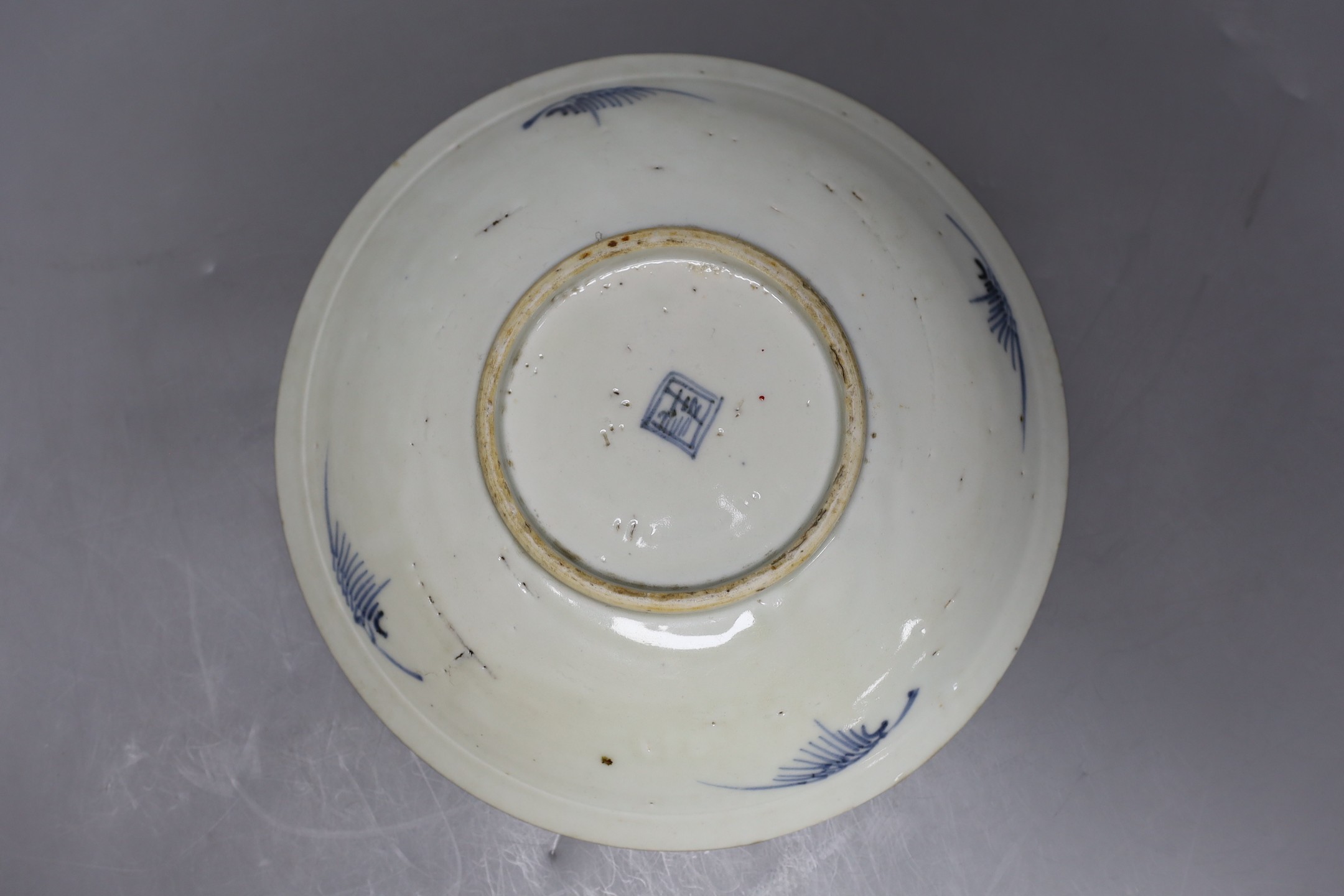 Four blue and white Chinese saucer dishes, 19th / 20thcentury, largest 25cm diameter